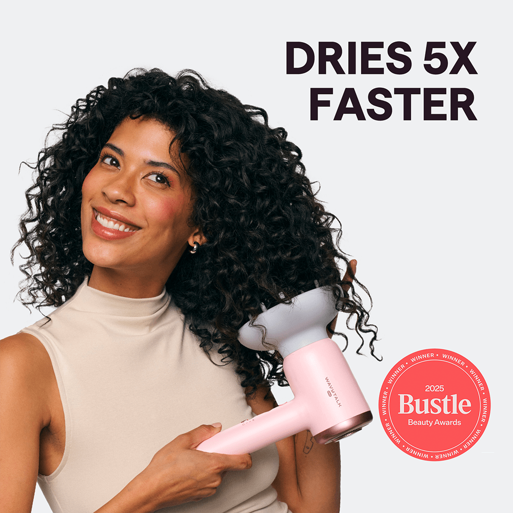 Woman with curly hair holding a pink Turblow Pro hair dryer with 'Dries 5x Faster' text and Bustle Beauty Award badge.
